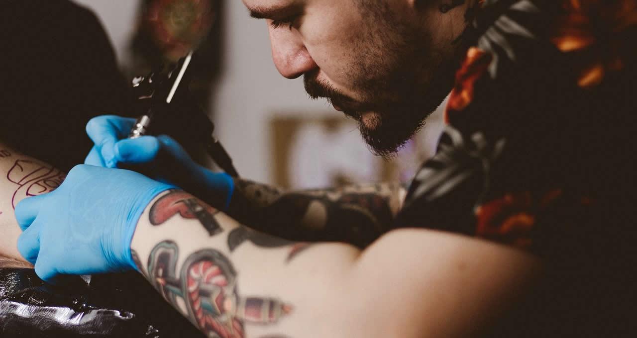 tattoo artist at work